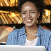 Woman at computer working on micro-credentials
